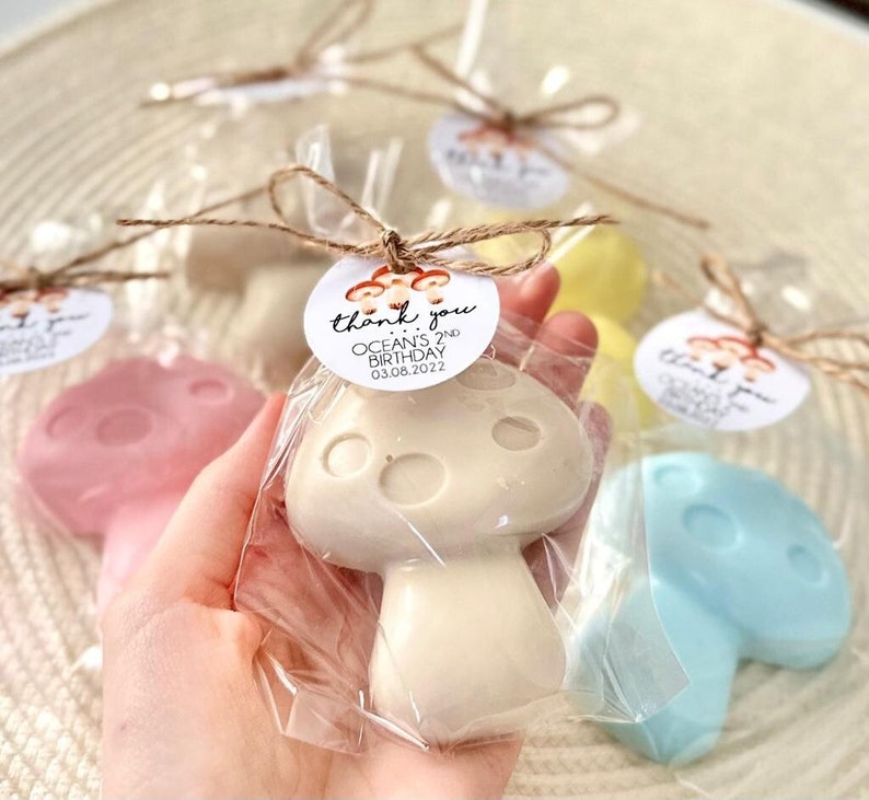 May include: Mushroom shaped soap favors with a thank you tag that reads "Thank you Ocean's 2nd Birthday 03.08.2022".