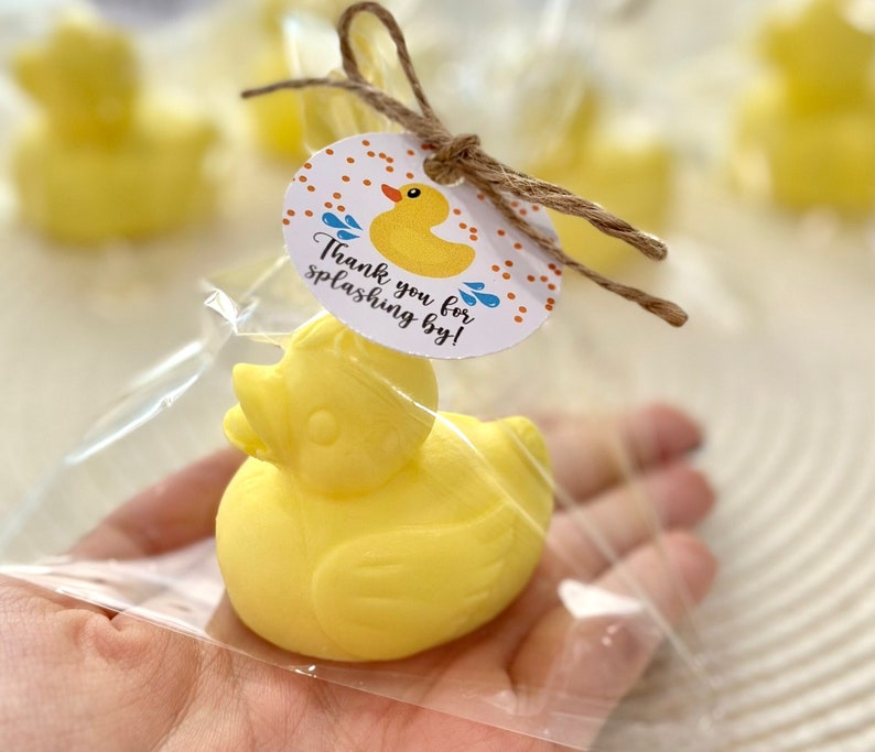 May include: Yellow rubber ducky favor in a clear plastic bag with a thank you tag that reads "Thank you for splashing by!"
