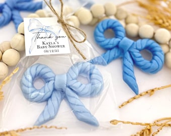 May include: Blue rope bow favor bags with a thank you tag that reads "Thank you Kayla's Baby Shower 08/12/25".