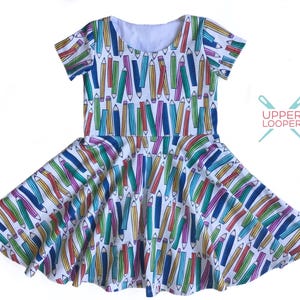 First Day of School Twirl Dress in Rainbow Pencils Print