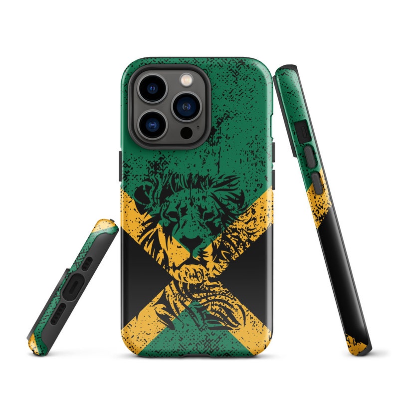May include: A black phone case with a green, yellow, and black design featuring a lion's head and a distressed look. The case is designed for an iPhone.