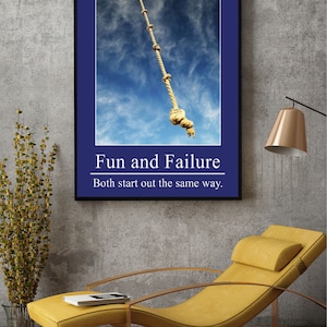 May include: A motivational poster with a blue background and a rope hanging from the top. The rope has a knot at the bottom. The text on the poster reads "Fun and Failure Both start out the same way."