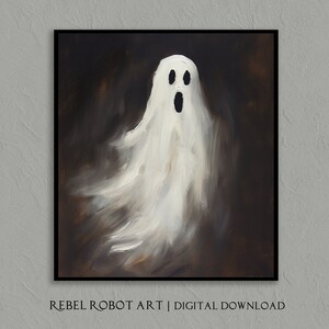 May include: A framed digital art print featuring a white ghost with an open mouth and black eyes against a dark brown background. The artwork is signed "REBEL ROBOT ART | DIGITAL DOWNLOAD".