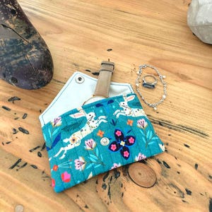Pochette matelassée pour bijoux, écouteurs, carte