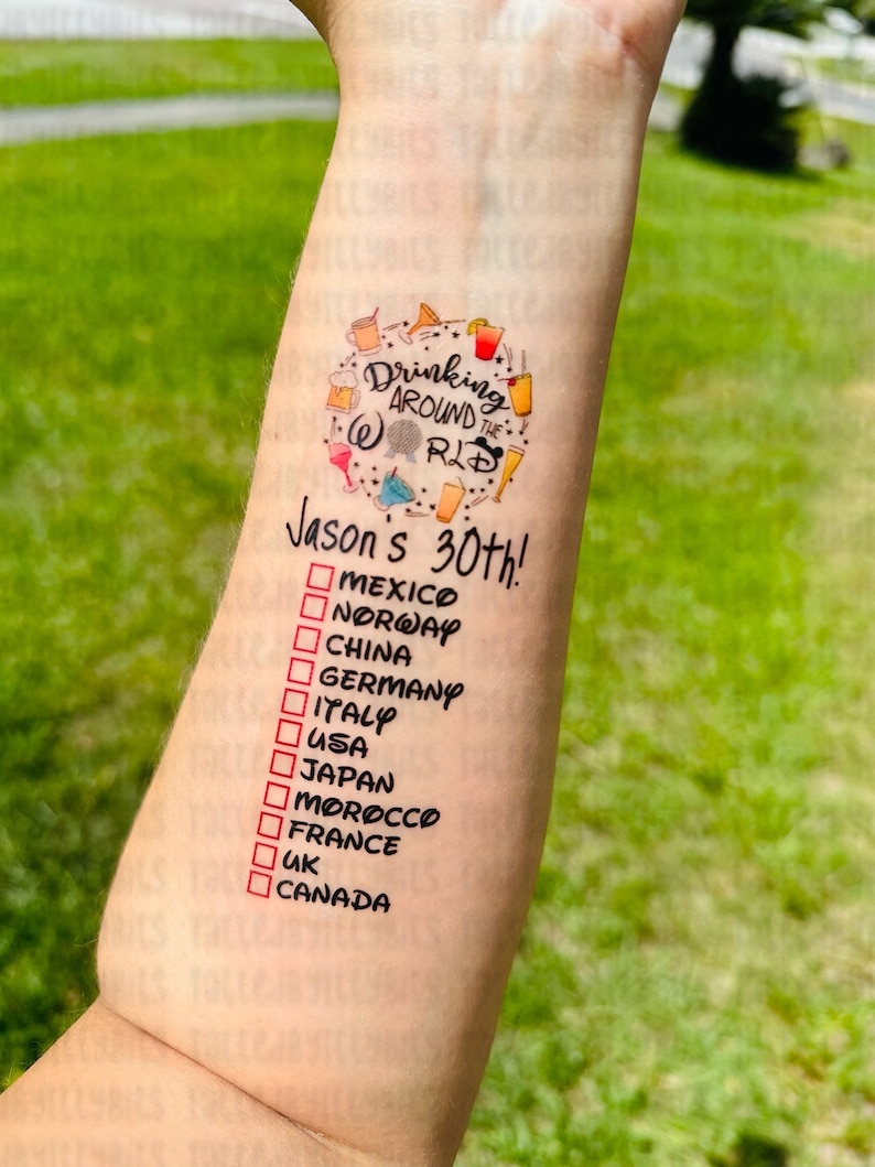 May include: A temporary tattoo with a circle of colorful drink icons and the text "Drinking Around the World" and "Jason's 30th!" with a checklist of countries to mark off.
