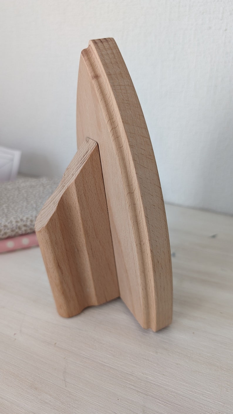 Klöppel mit Griff aus Holz. Bild 5