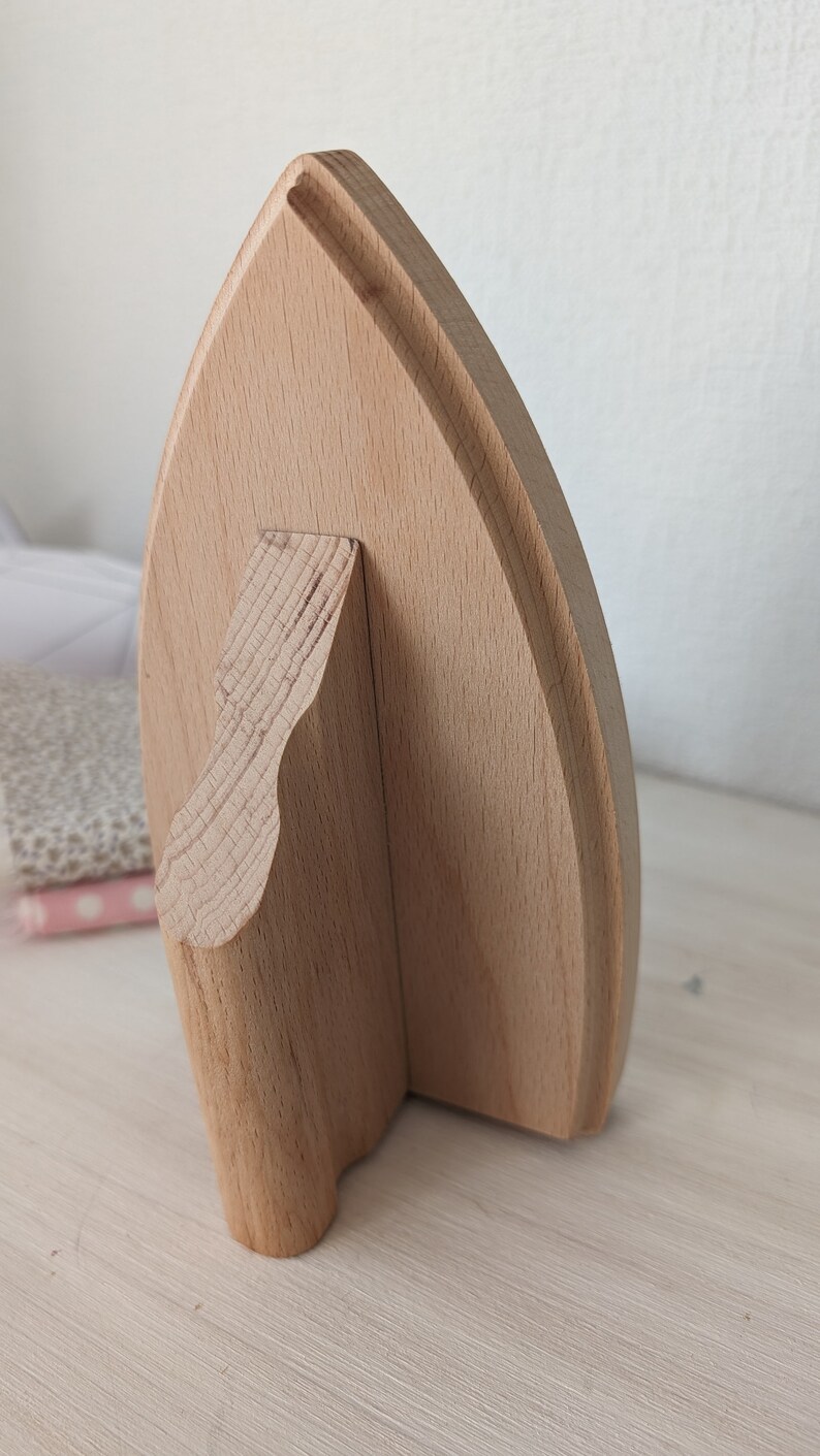 Klöppel mit Griff aus Holz. Bild 4
