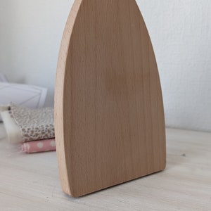 Klöppel mit Griff aus Holz. Bild 2