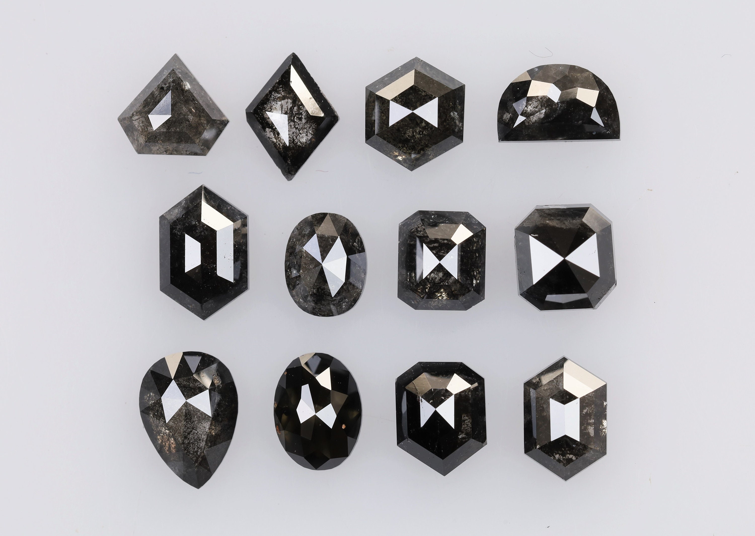 6.37 Ct, 6.5 X 4.7 X 2.6 MM, Natural Fancy Black Color Mix