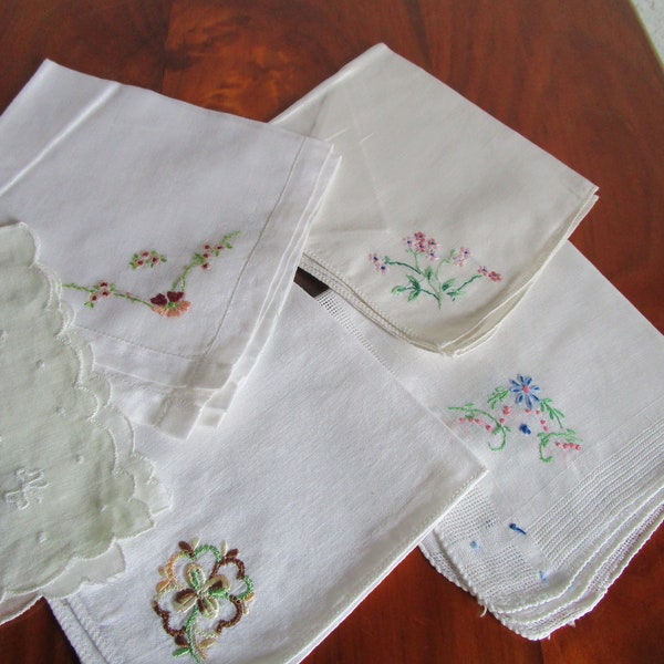 Lot of 5 embroidered hanky, nose wipes, handkerchiefs. All cotton mid-century gently used in clean conition. 12-14" pocket squares.