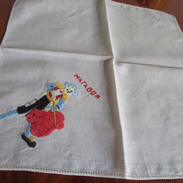 Matador pocket square handkerchief, hand embroidered midcentury in gently used condition.