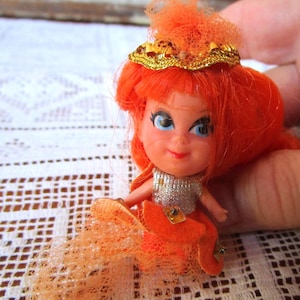 Little Kiddle 1960s Orange Kone used. Mattel 2 inch doll.