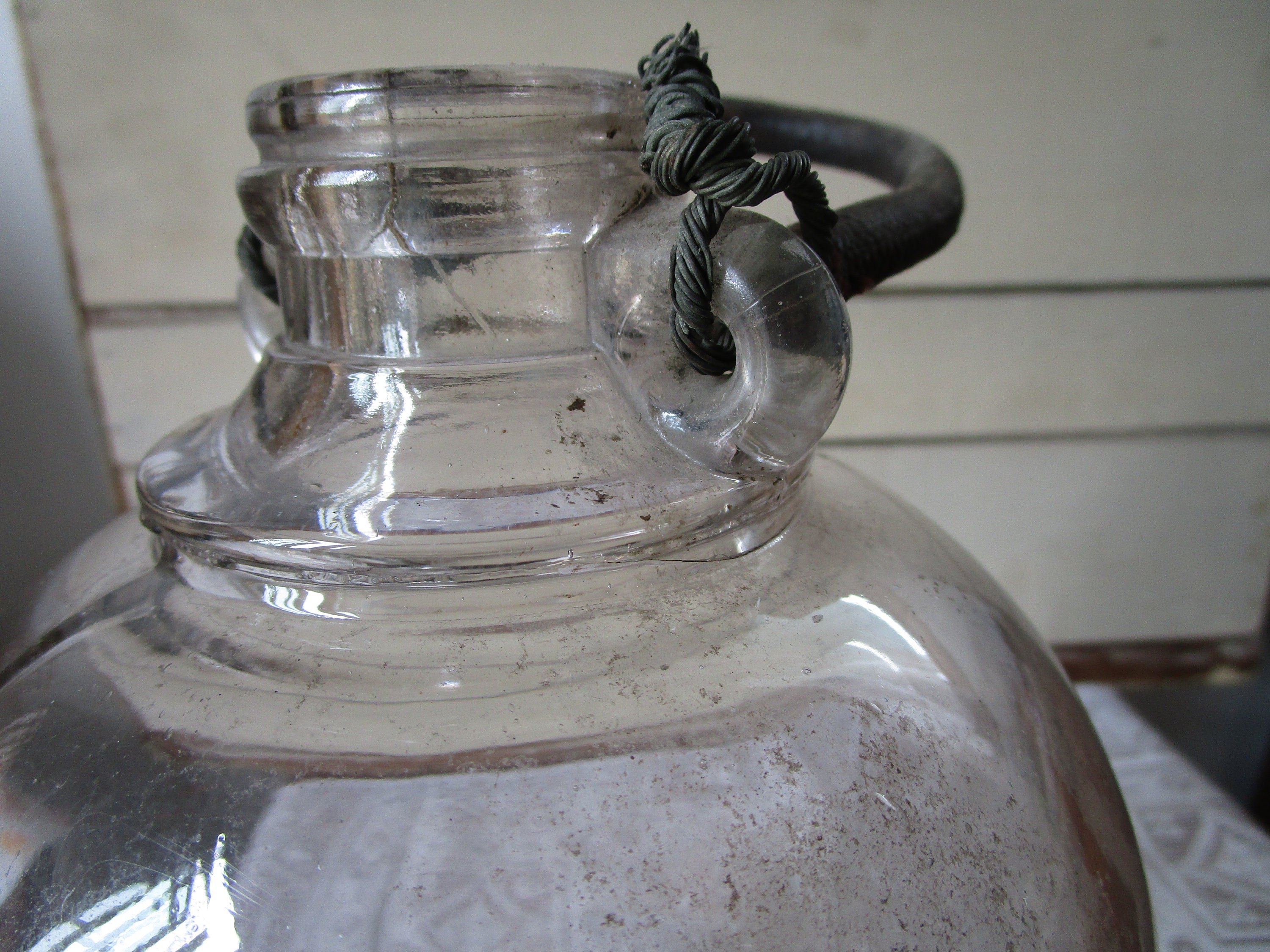 Antique gallon jug w leather wrapped wire handle and cork. Etsy