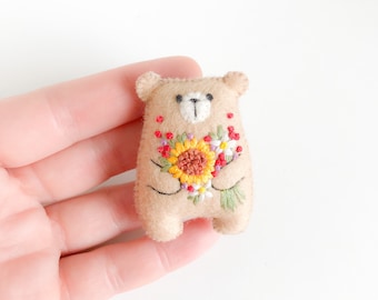 Miniature teddy bear plushie, wildflowers sunflowers embroidered flowers bouquet floral pattern, pocket bear hug, cute animals, stuffed bear