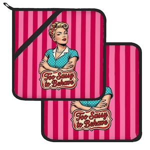 May include: Two square pot holders featuring a pink and dark pink vertical striped pattern. Each pot holder displays a graphic of a person with blonde hair and a blue polka dot shirt, with the text Too Sassy to Behave in a decorative frame.