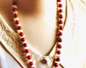 SPRING SALE  70s Miriam Haskell one strand long necklace. Burnt red beads with alternating white mother of pearl pieces. Signed