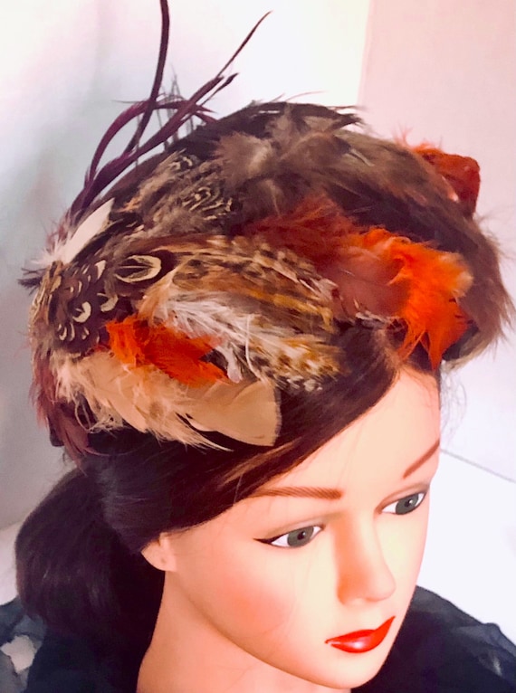 50’s mid-century, cocktail Evelyn Varon fall, winter bright earth tones pheasant feather hat with side Star and sculptured look.