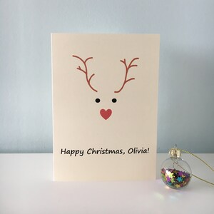 Biglietto di auguri di Natale personalizzato con piccola renna (biglietto singolo o multipack di biglietti di Natale)