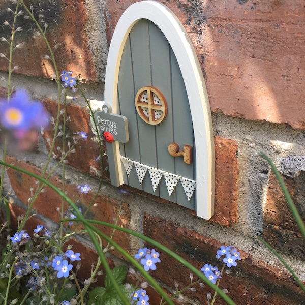 Outdoor handpainted garden fairy and elf doors, in Farrow and Ball Pigeon with personalised sign post