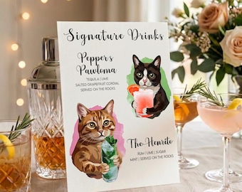 May include: A white rectangular sign titled Signature Drinks featuring illustrations of two cats holding cocktails. One cat is brown tabby with a green drink, and the other is black and white with a pink drink. Text includes Pepper's Pawloma and The Henrito.