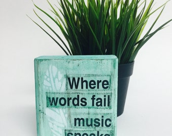 Quotable Wood Art- "where words fail music speaks"
