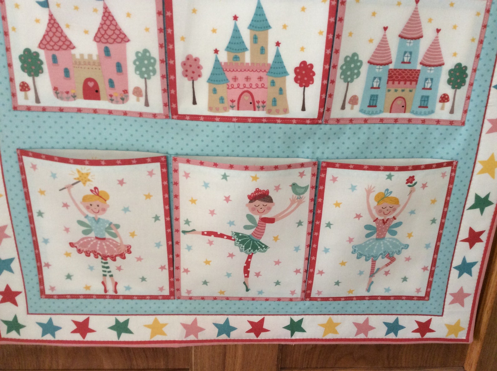 girls/childrens fabric wall hanging/storage , 11 pocket panel, princess design backed with ballet shoe design fabric, 100% cotto