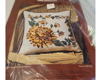May include: A Sew Simple Inc. pillow kit in a plastic package featuring a square pillow with a large yellow and orange chrysanthemum flower design on a cream background. The packaging includes the text Chrysanthemum Spray and Stock #CRP7014.