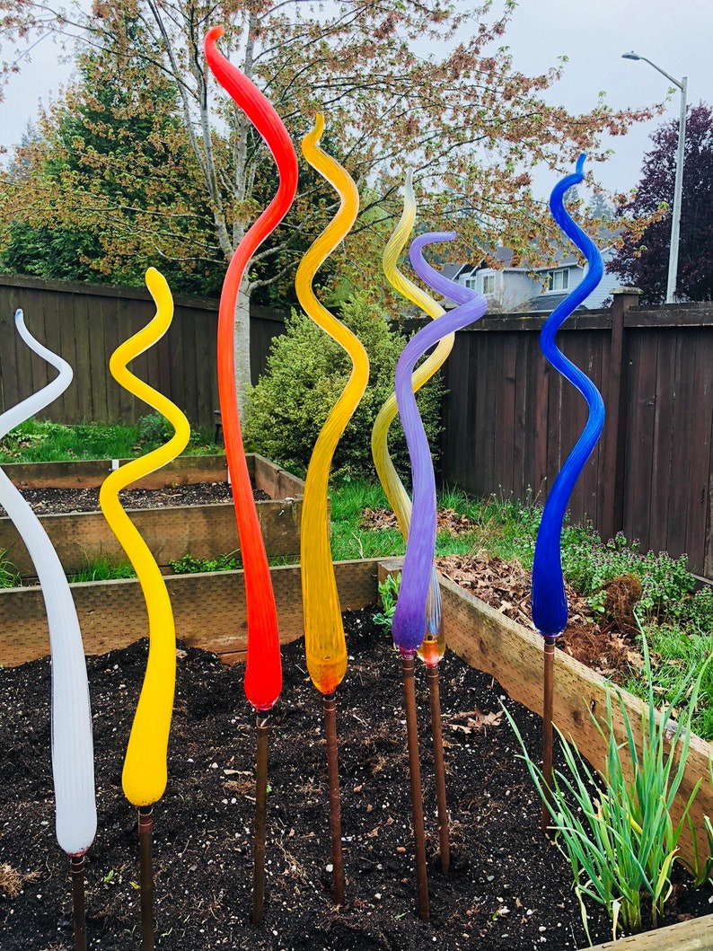 Glass yard art spirals Etsy