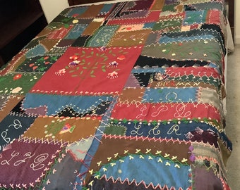 Vintage crazy quilt with crewel embroidery