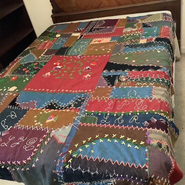 Vintage crazy quilt with crewel embroidery