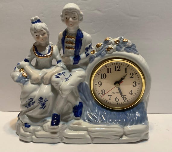 Vintage Porcelain Blue and White Colonial Couple Quartz Mantel