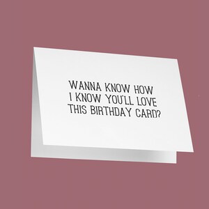 May include: A white birthday card with the text "Wanna know how I know you'll love this birthday card?" against a mauve background. The card is folded and slightly angled, showcasing the message.