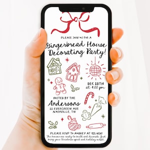 May include: A smartphone displays a festive invitation for a Gingerbread House Decorating Party. The invitation features red and green illustrations of gingerbread houses, a gingerbread man, and candy canes. The event is hosted by the Andersons in Nashville, TN, on December 20th at 4:00 pm.