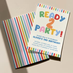 May include: Two birthday party invitations. One invitation features the text "READY 2 PARTY!" in colorful bubble letters. The invitation also includes the text "PLEASE JOIN US TO CELEBRATE OLIVER'S 2ND BIRTHDAY!" The other invitation has a striped pattern.