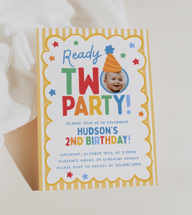 May include: A rectangular birthday invitation card with yellow and white vertical stripes on the border. The text reads Ready TWO PARTY! Hudson's 2nd Birthday, Saturday, October 18th, at 3:00PM, Hudson's house, 24 Sunshine Avenue, RSVP to Rachel at 123.4567.8910.