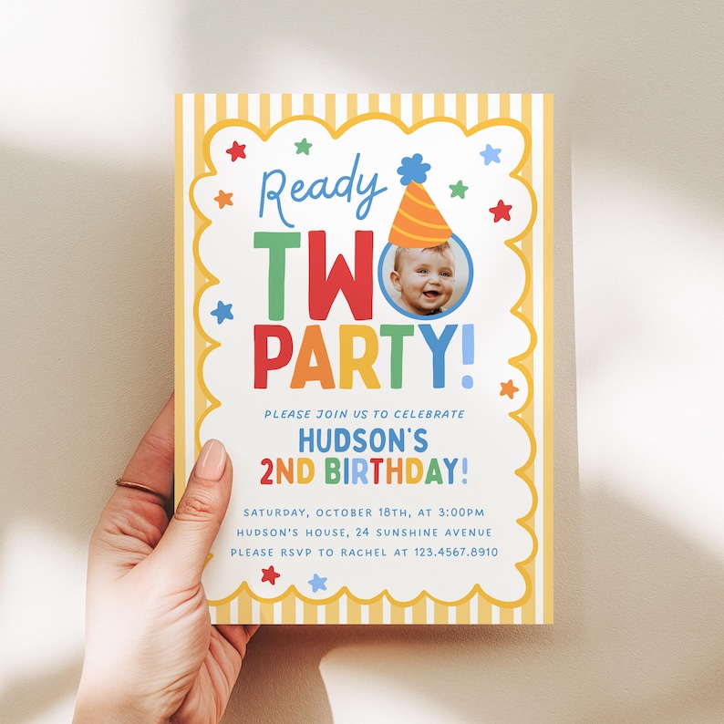 May include: A rectangular birthday invitation card with a yellow and white striped border and a scalloped frame. The text reads Ready TWO PARTY! with a photo of a child in a party hat. Details include Hudson's 2nd birthday, date, and RSVP info.