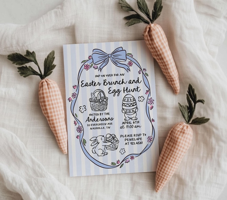 May include: An Easter Brunch and Egg Hunt invitation with a blue bow and floral accents. The invitation is surrounded by three fabric carrots with green tops. The invitation includes the text: "HOP ON OVER FOR AN Easter Brunch and Egg Hunt".