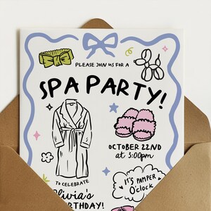 May include: Spa party invitation with a blue border and illustrations of spa-related items. The invitation includes the text "SPA PARTY!" and details for Olivia's birthday on October 22nd at 3:00 pm. The invitation is inside a brown envelope.