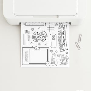 May include: A white printer printing a black and white activity sheet with the text "hooray! welcome BACK TO SCHOOL!". The sheet includes a maze, word scramble, and space to draw a summer memory. Two silver paper clips are on the white surface.