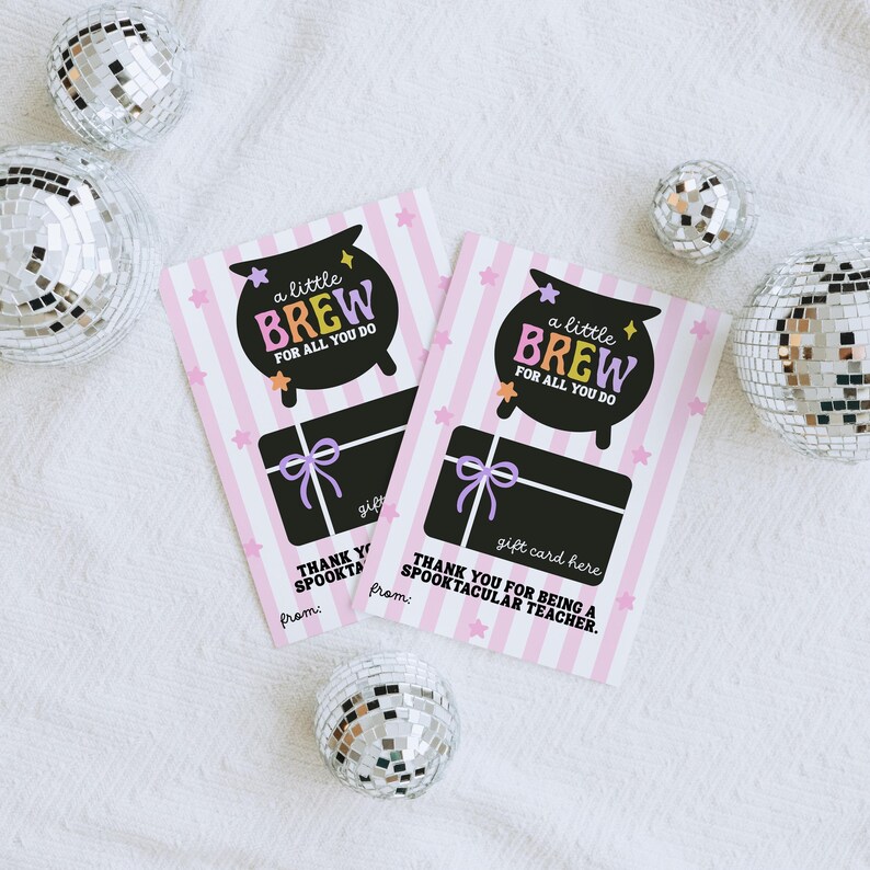 May include: Two gift cards with a pink and white striped background, featuring a black cauldron design with the words "a little BREW FOR ALL YOU DO." The cards also say "gift card here" and "THANK YOU FOR BEING A SPOOKTACULAR TEACHER."