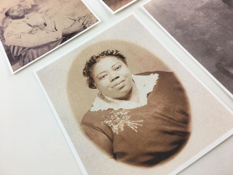 May include: A sepia-toned portrait of a woman with a lace collar and a beaded embellishment on her dress.