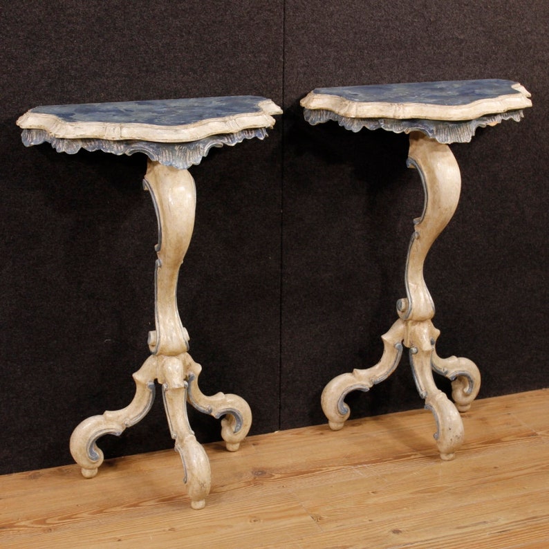 Pair of lacquered and painted Venetian consoles
