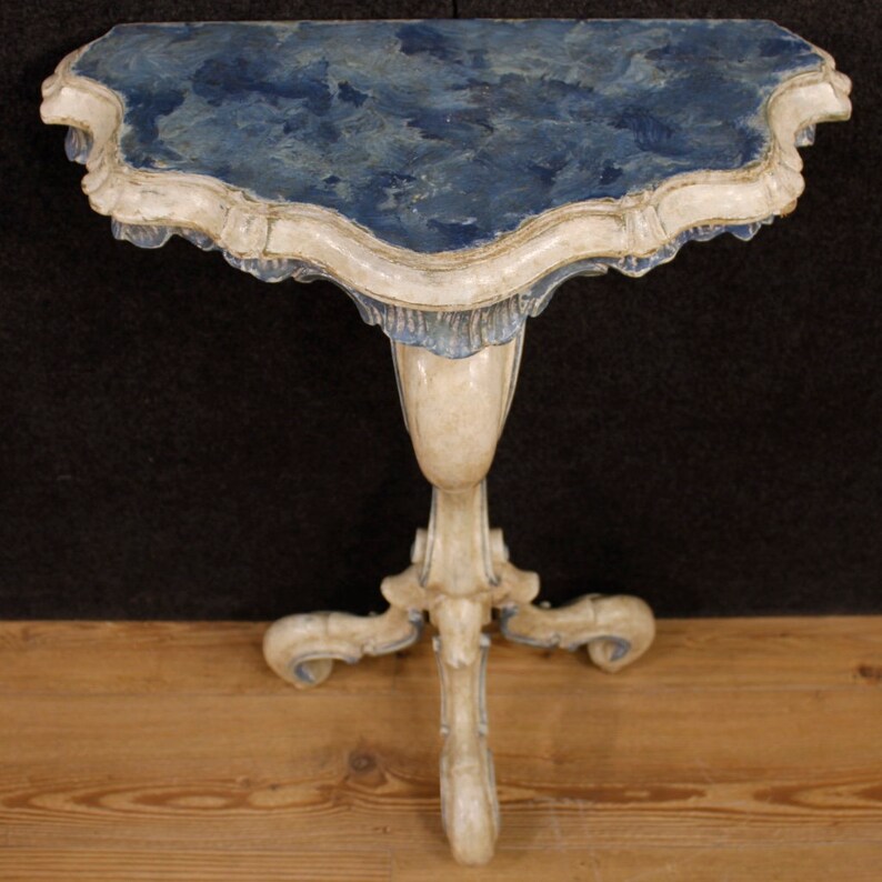 Pair of lacquered and painted Venetian consoles