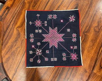 Vintage tribal White Dao hand embroidered headscarf in Lai Chau province in the north of Vietnam