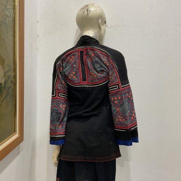 Vintage tribal Hmong embroidered,hand stitch appliqué women jacket in Mu Cang Chai village in the north of Vietnam