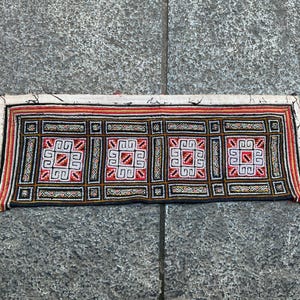 Vintage tribal white Hmong embroidered collar in Mu Cang chai village,in the north of Vietnam