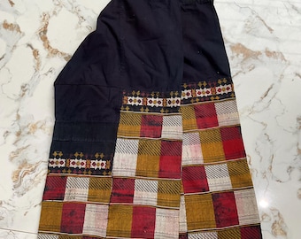 Vintage tribal Red Dao embroidered women trousers in Babe area,CaoBang province,Vietnam