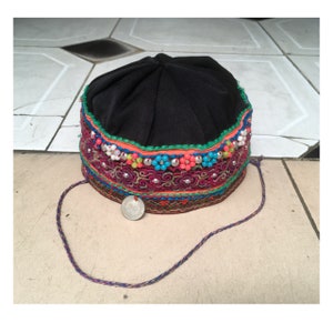 Vintage tribal Meo children&#39;s hat in DienBien province in the north of Vietnam