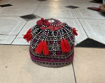 Vintage tribal Red Dao children's hat in the north of Vietnam