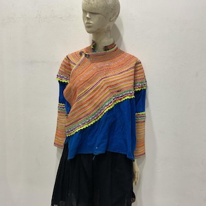 Vintage tribal Flower Hmong women tunic jacket in Bac Ha area,north of Vietnam